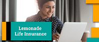Woman smiling lookin up lemonade life insurance on her laptop