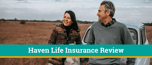 Man and woman are walking on beach smiling after a review of Haven life insurance